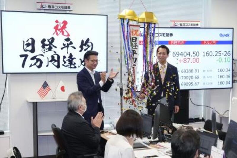 東証、一時初の7万円 終値は最高値更新、利上げ安心感｜信濃毎日新聞