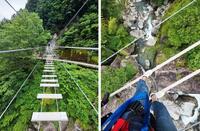 　つり橋の長さは100メートル。綱をしっかり握り、恐る恐る渡っていく＝高知県仁淀川町
