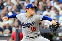 　リーグ優勝決定シリーズ、ブルワーズとの第2戦に先発したドジャースの山本由伸＝12日、ミルウォーキー（ロイター＝共同）