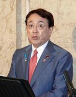 　閣議後に記者会見する赤沢経産相＝16日午前、国会
