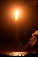 　火星衛星探査計画「MMX」の探査機を載せ、上昇するH3ロケット10号機＝20日午前4時41分、鹿児島県の種子島宇宙センター